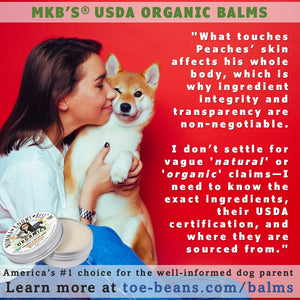 Woman kissing dog with MKB Organic Paw Balm