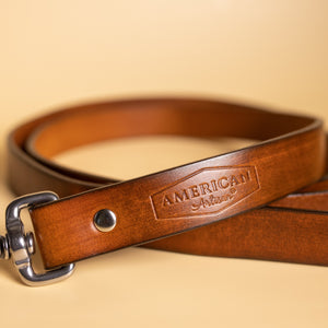 leather leash for a dog by American Artisan and toe beans